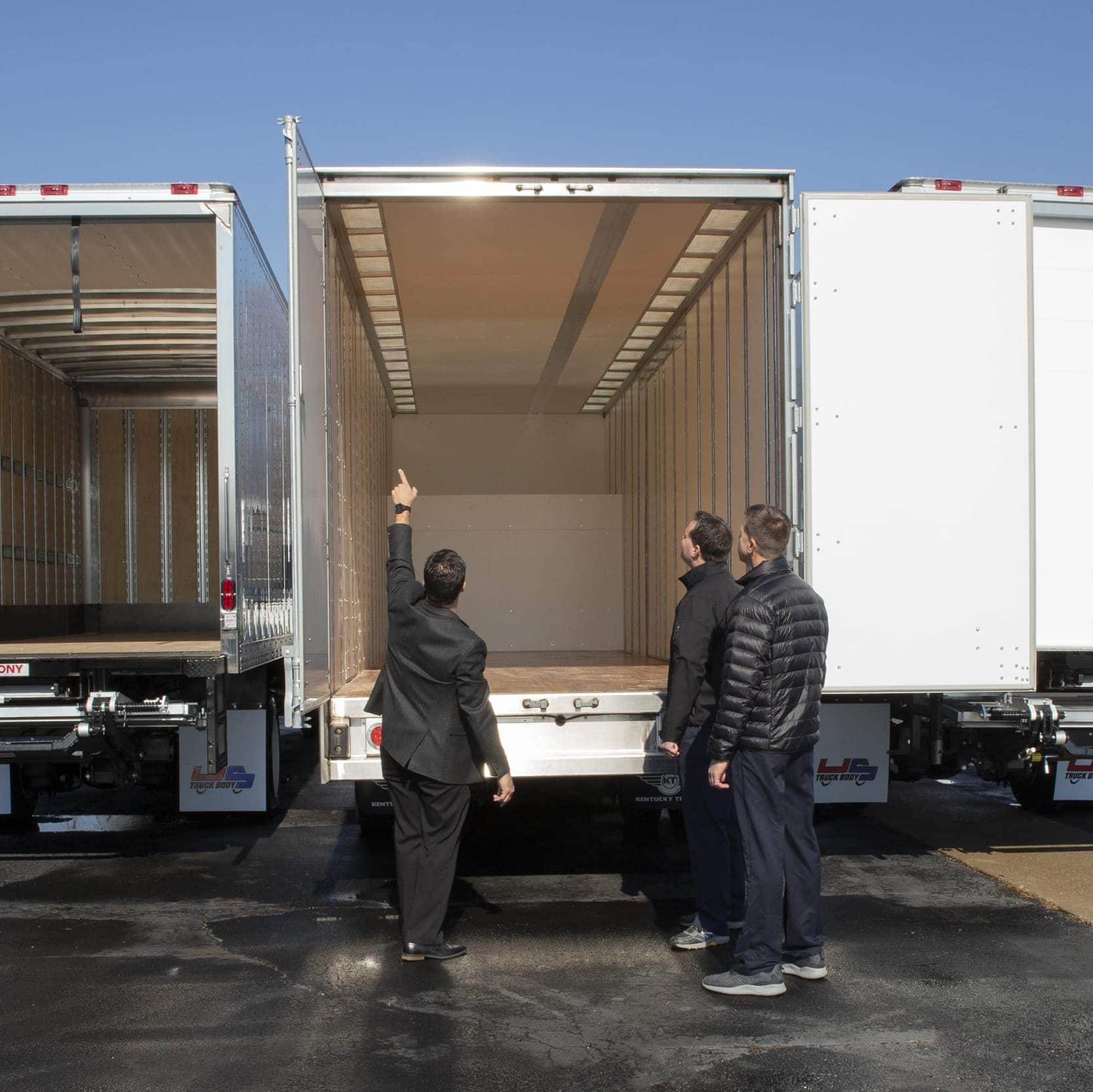 Trans Advantage sales rep shows trailers to customers